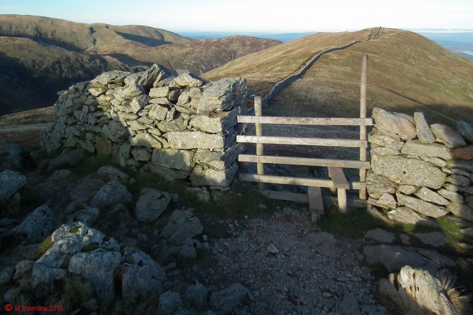 The Hole-In-The-Wall, with Birkhouse Moor beyond.
