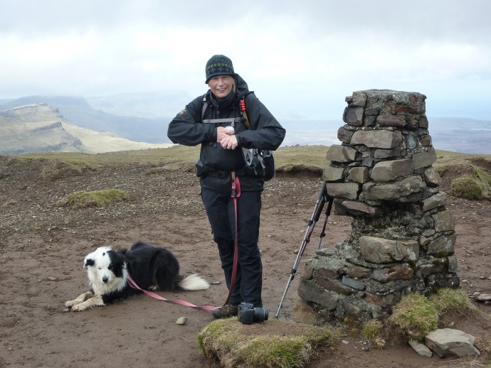 Beth and Jake and the trig point - lots of wind!